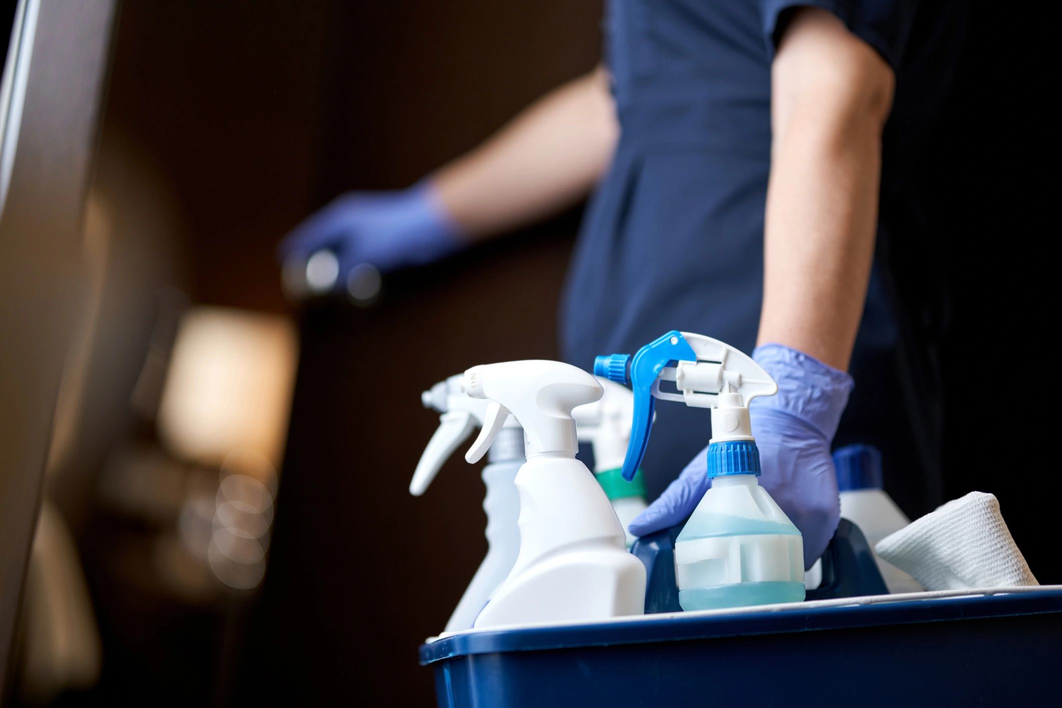 professional cleaners cleaning empty rental